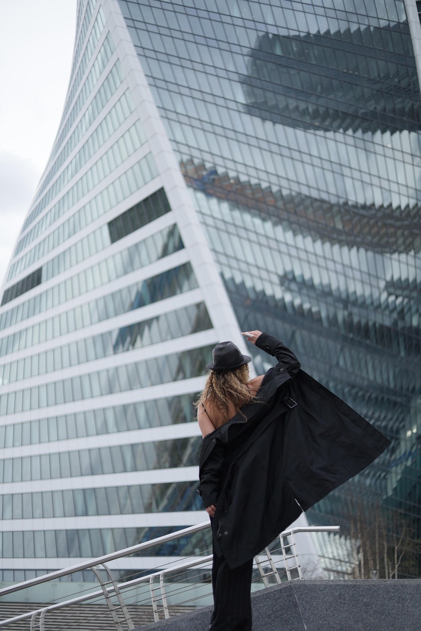 woman, skyscrapers, business city, posing, model, fashion, style, urban style, black clothes, metal and glass, moscow city, modern city